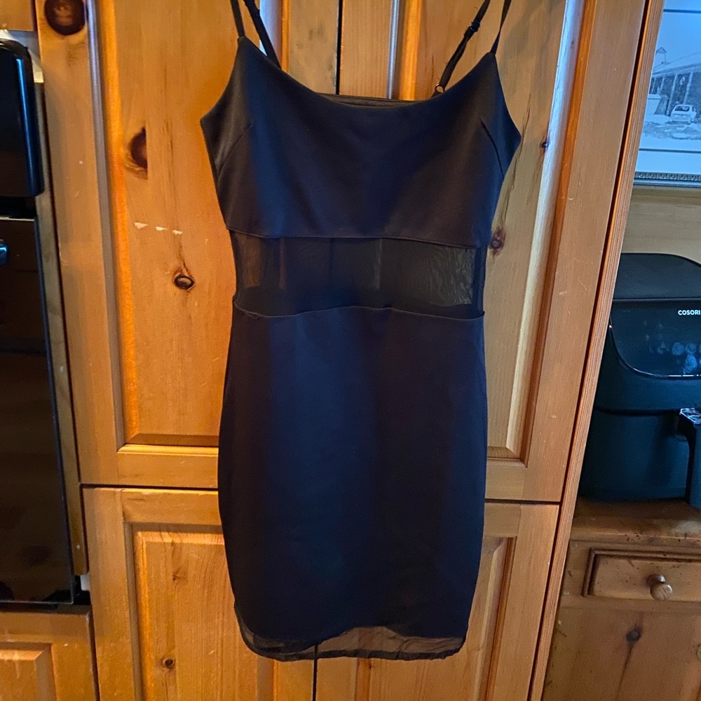 Mesh middle and bottom, tight fitting shirt black dress, spaghetti strap